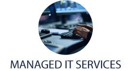 Managed It Services - man's hands on keyboard with computer screens in background